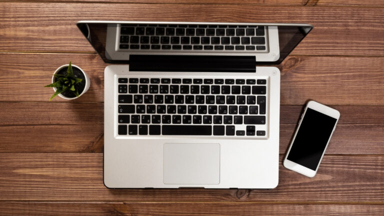 Laptop on wooden table