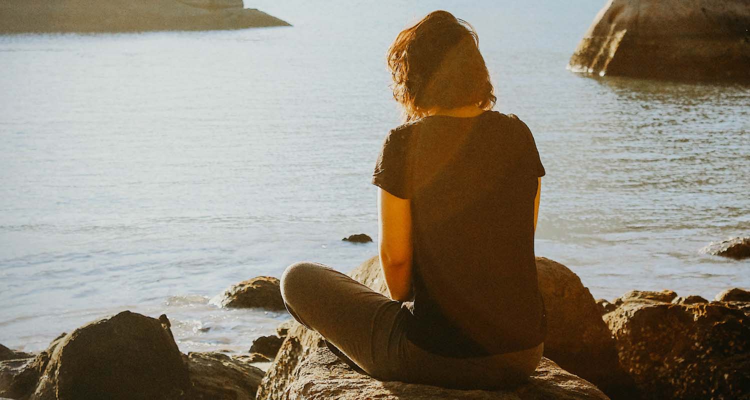 meditating by water